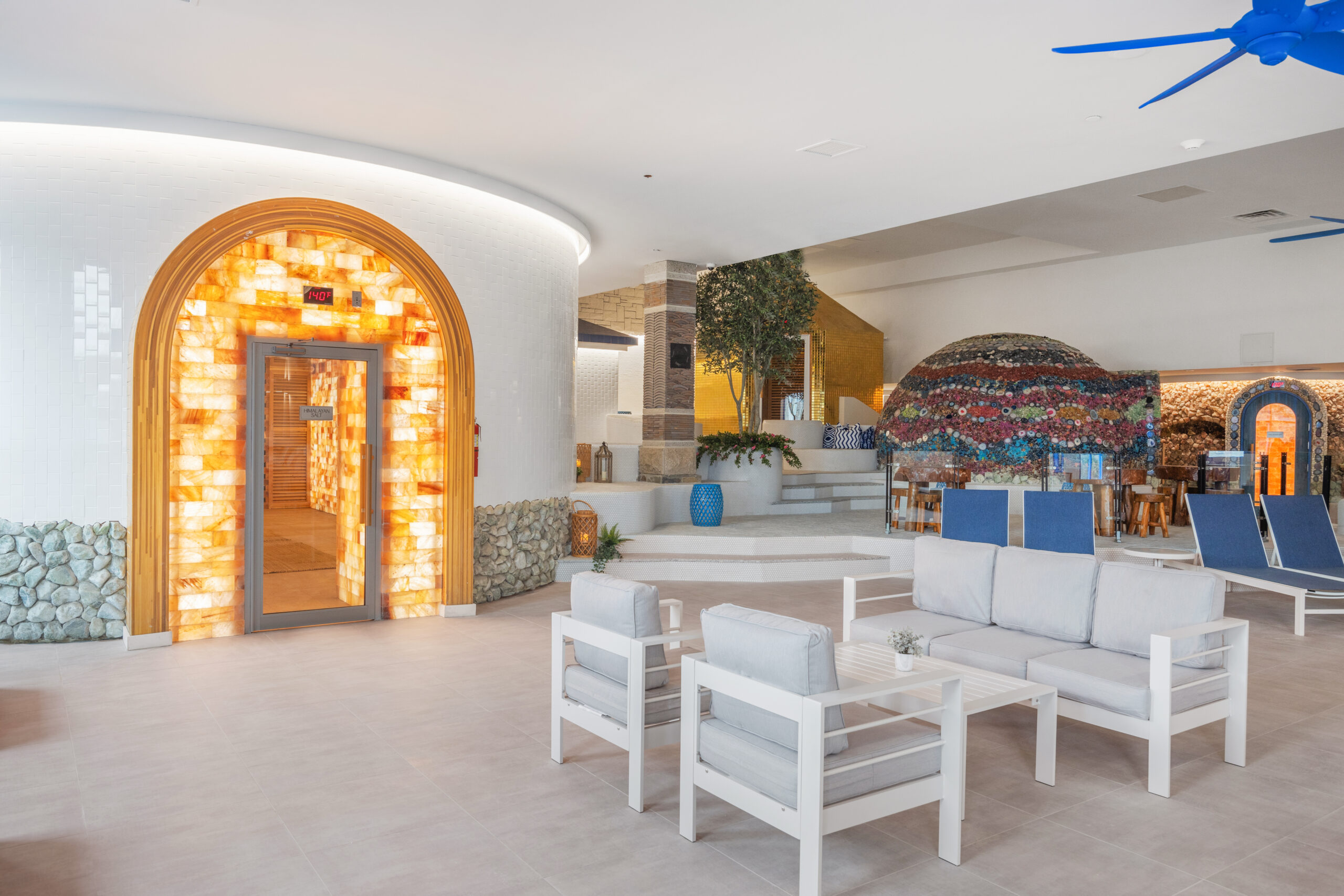 left side view of sauna valley, showcasing the entrance to the Himalayan Salt Sauna, with views of the gold, jade and halotherapy saunas.