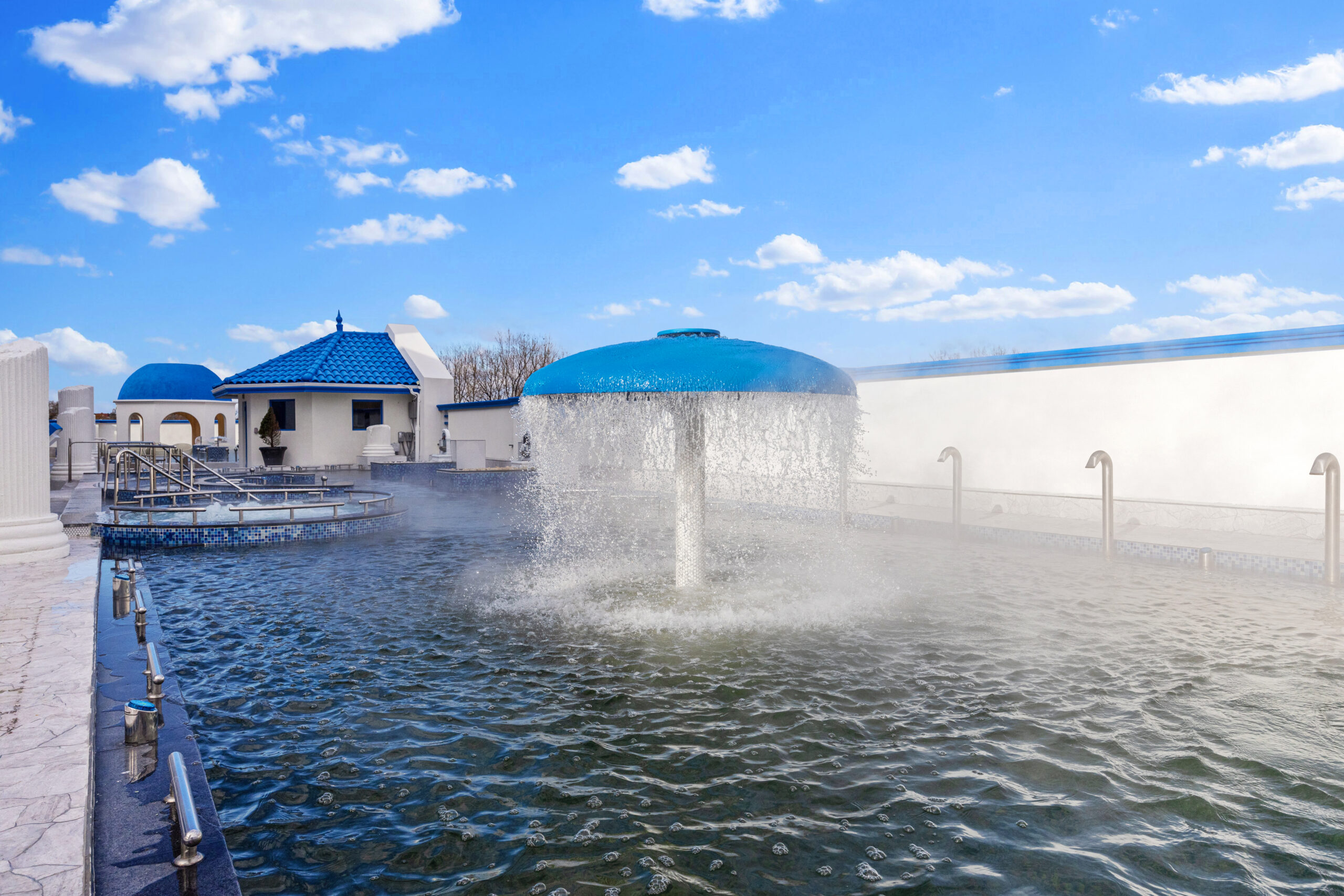 mushroom jet featured in the Standing Medi Spa Pool, displaying cascading water from the overhead umbrella like nozzle.